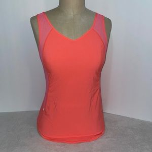 Lululemon Pink v neck scoop hem with sheer sides and reflective accents